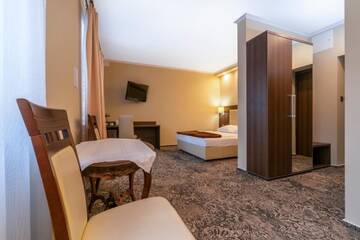 Фото номера Двухместный номер Делюкс с 1 кроватью Отель Hotel Promien г. Скаржиско-Каменна 4